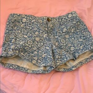 Blue and white floral printed denim shorts